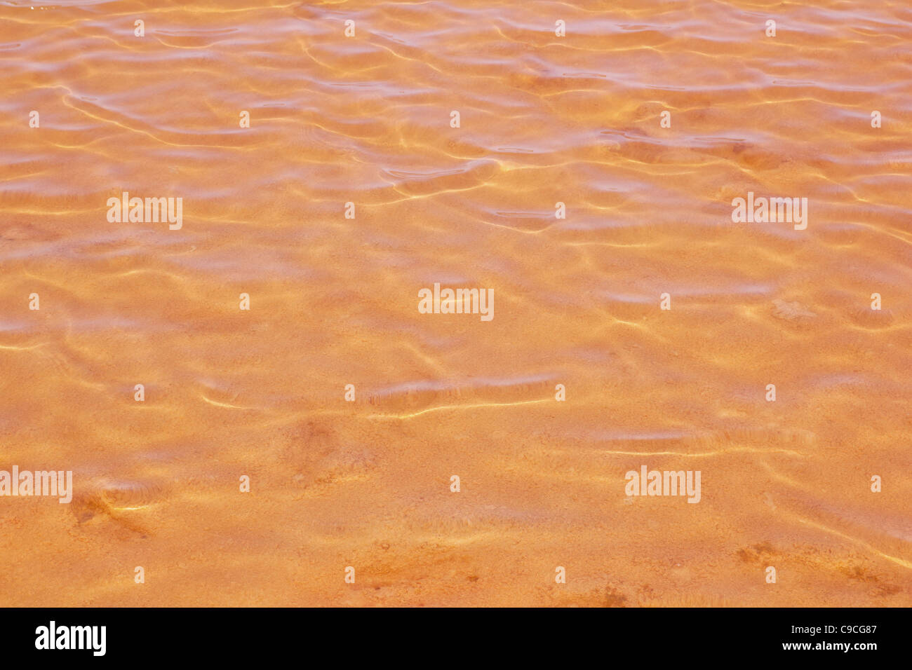Formentera Ses Salines Saline rot orange Wasser der Seen mit Wellen Wellen Stockfoto