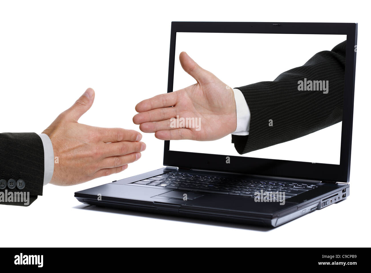 Handshake über monitor Stockfoto