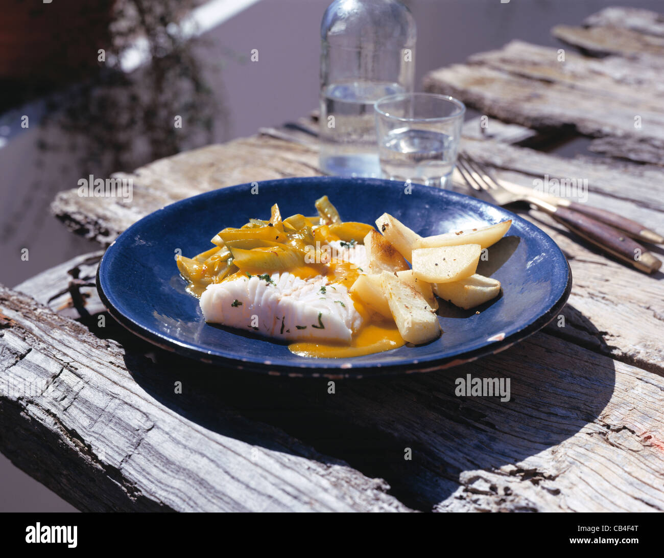 Filet vom spined Loach mit Lauch - Safran-sauce Stockfoto