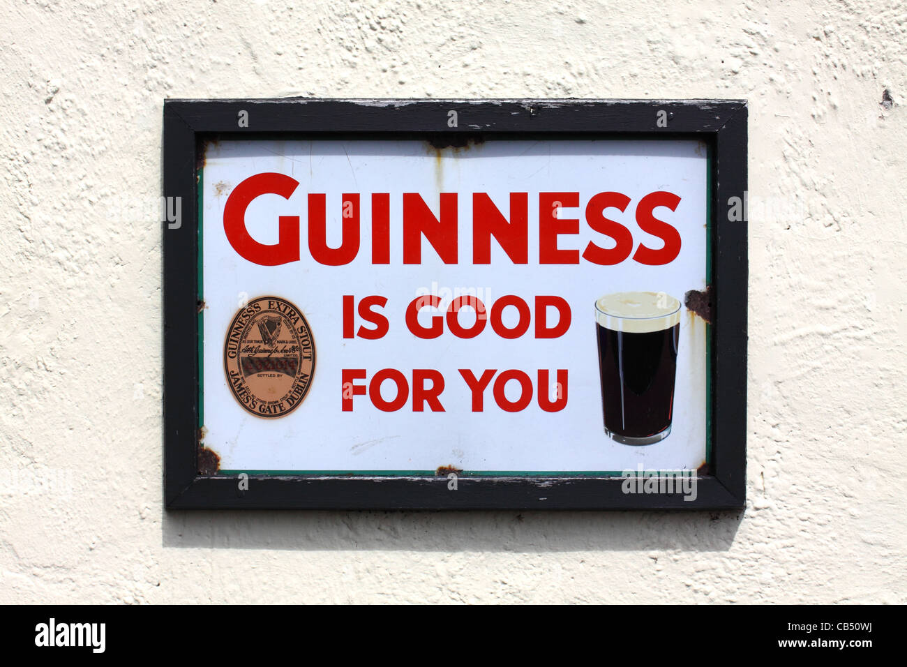 Alten Stahl Werbeschild für Guinness Stockfoto