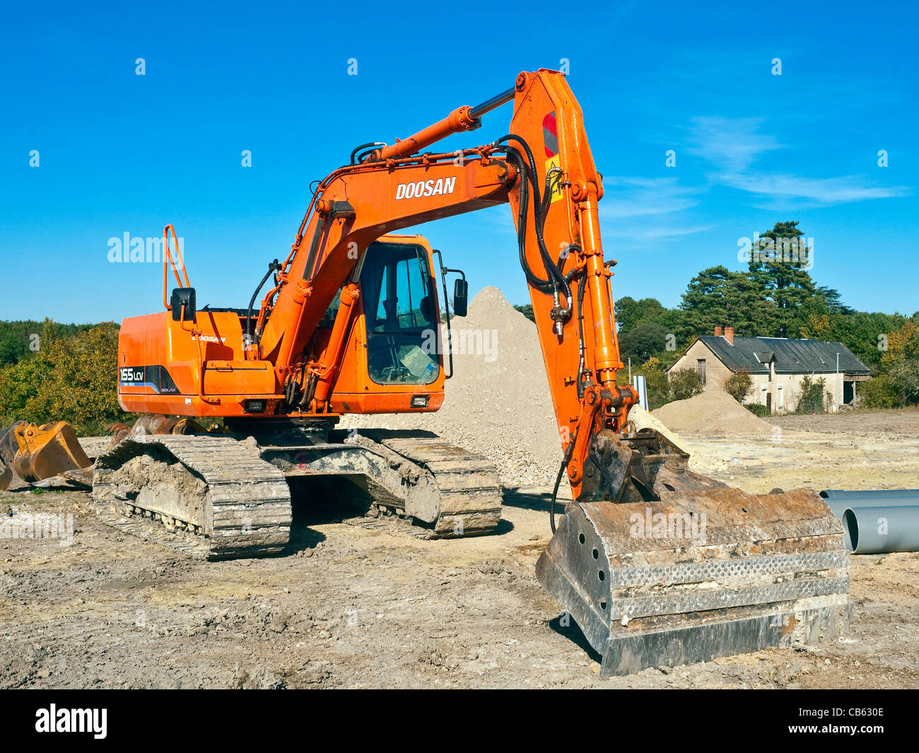 Mechanischen Bagger auf der Baustelle - Frankreich. Stockfoto