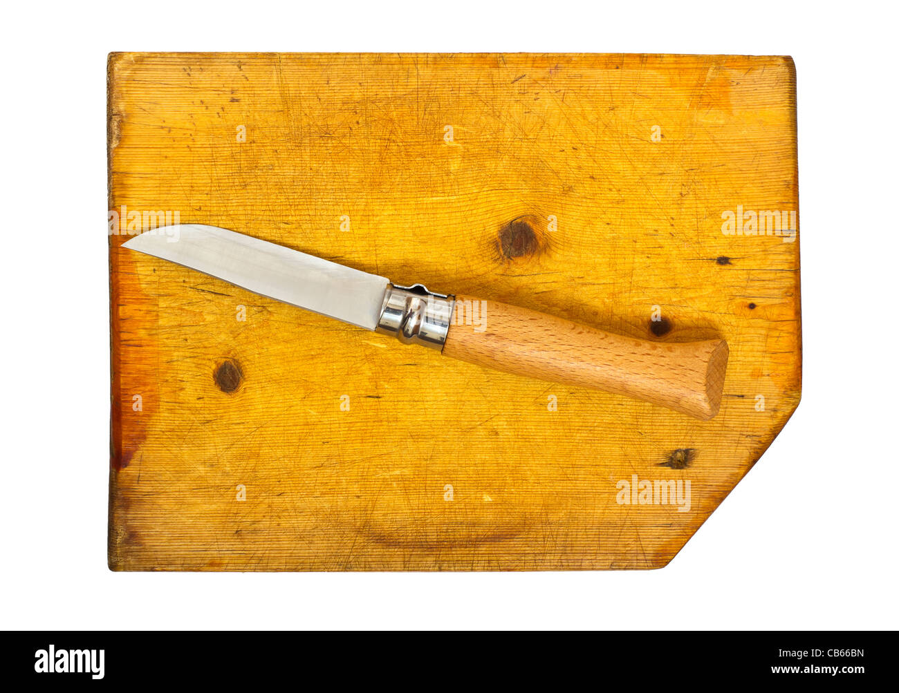 Küchenmesser auf das Schneidbrett isoliert auf weißem Hintergrund Stockfoto