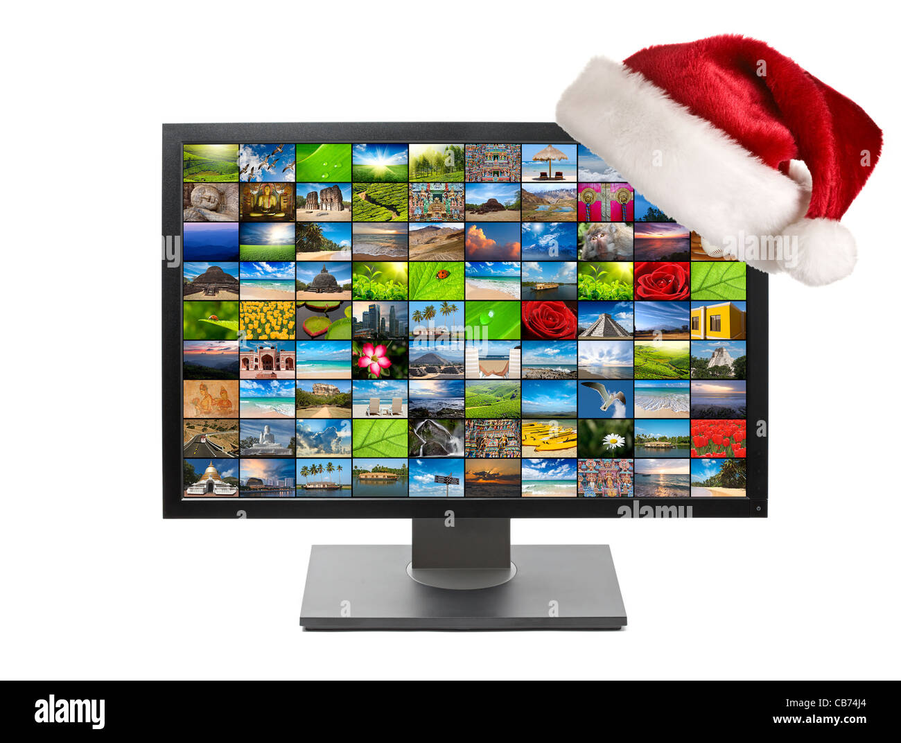 Weihnachten-Konzept social-Media - Monitor mit Multimedia-Hintergrund Bilder mit Weihnachtsmütze Stockfoto
