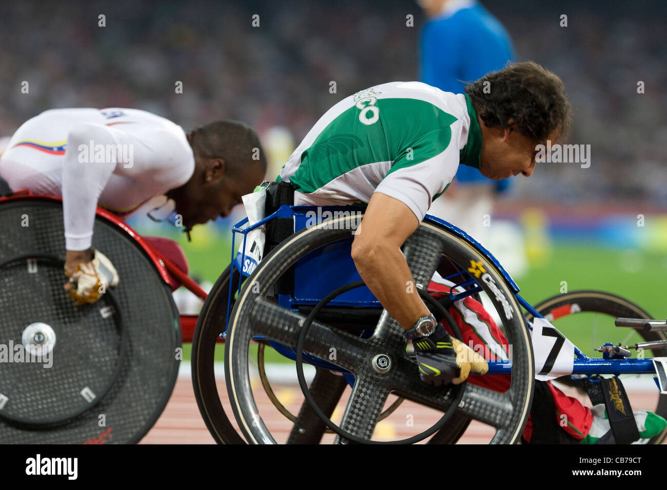 sportlichen Wettkampf auf die Paralympischen Spiele 2008 zeigt die Athleten in T52 100 Meter Rollstuhl Männerrennen final Stockfoto