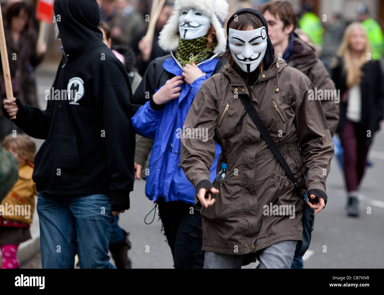 Öffentlichen Sektor Streik (Gewerkschaften) Demonstranten tragen V wie Vendetta, Guy Fawkes Masken, London, England, Vereinigtes Königreich, 2011 Stockfoto