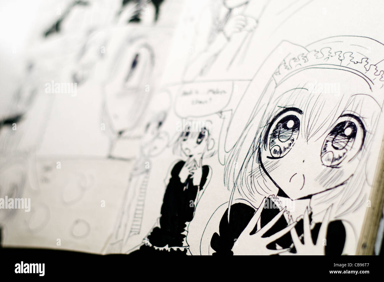 Detail der schwarzen und weißen japanisches Manga Zeichnungen in einem Comic-Buch Stockfoto