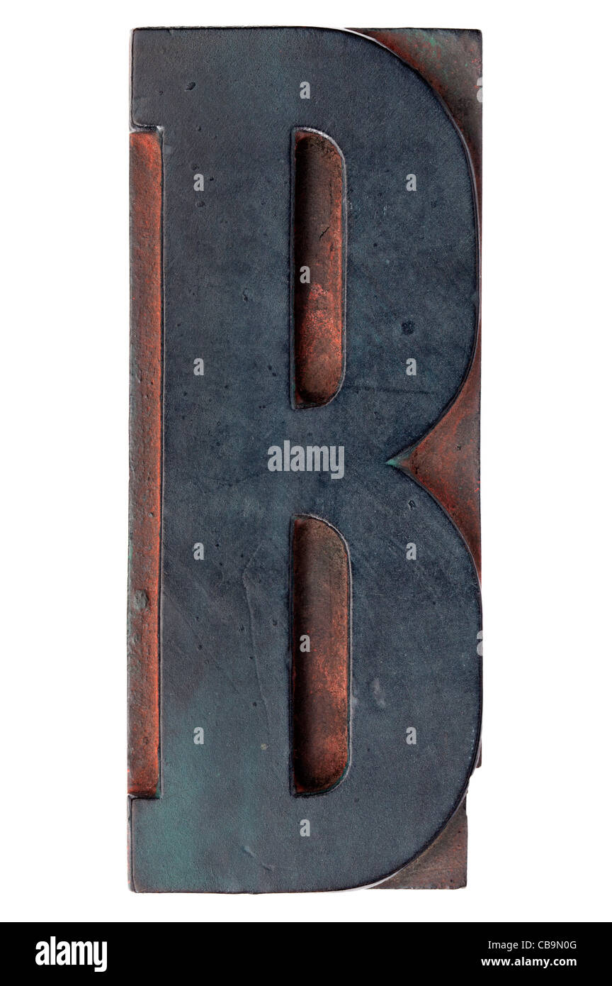 Buchstabe B - isolierte Antik Holz Buchdruck drucken Block befleckt durch Farbe Tinten Stockfoto