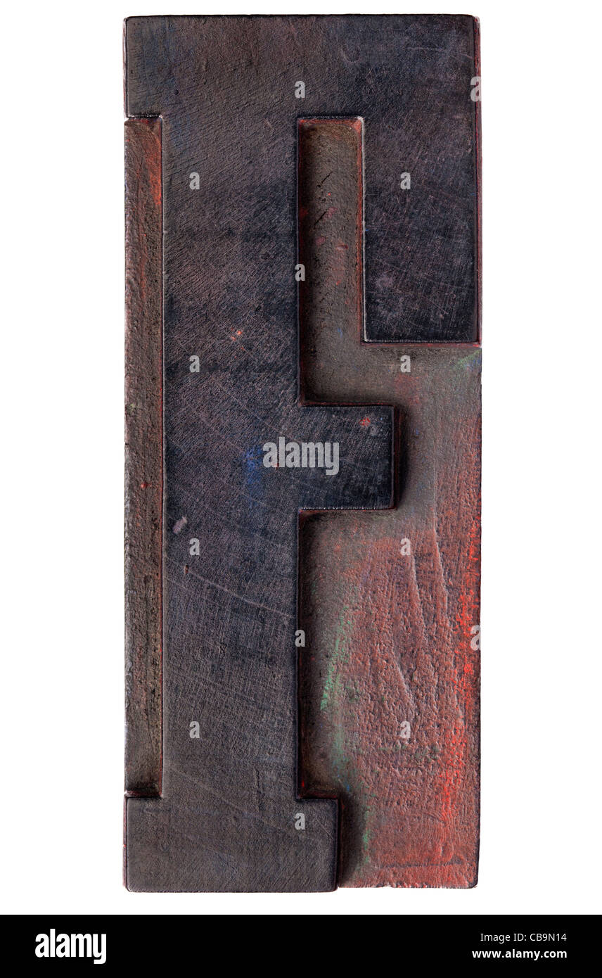 Buchstabe F - isolierte Antik Holz Buchdruck drucken Block befleckt durch Farbe Tinten Stockfoto