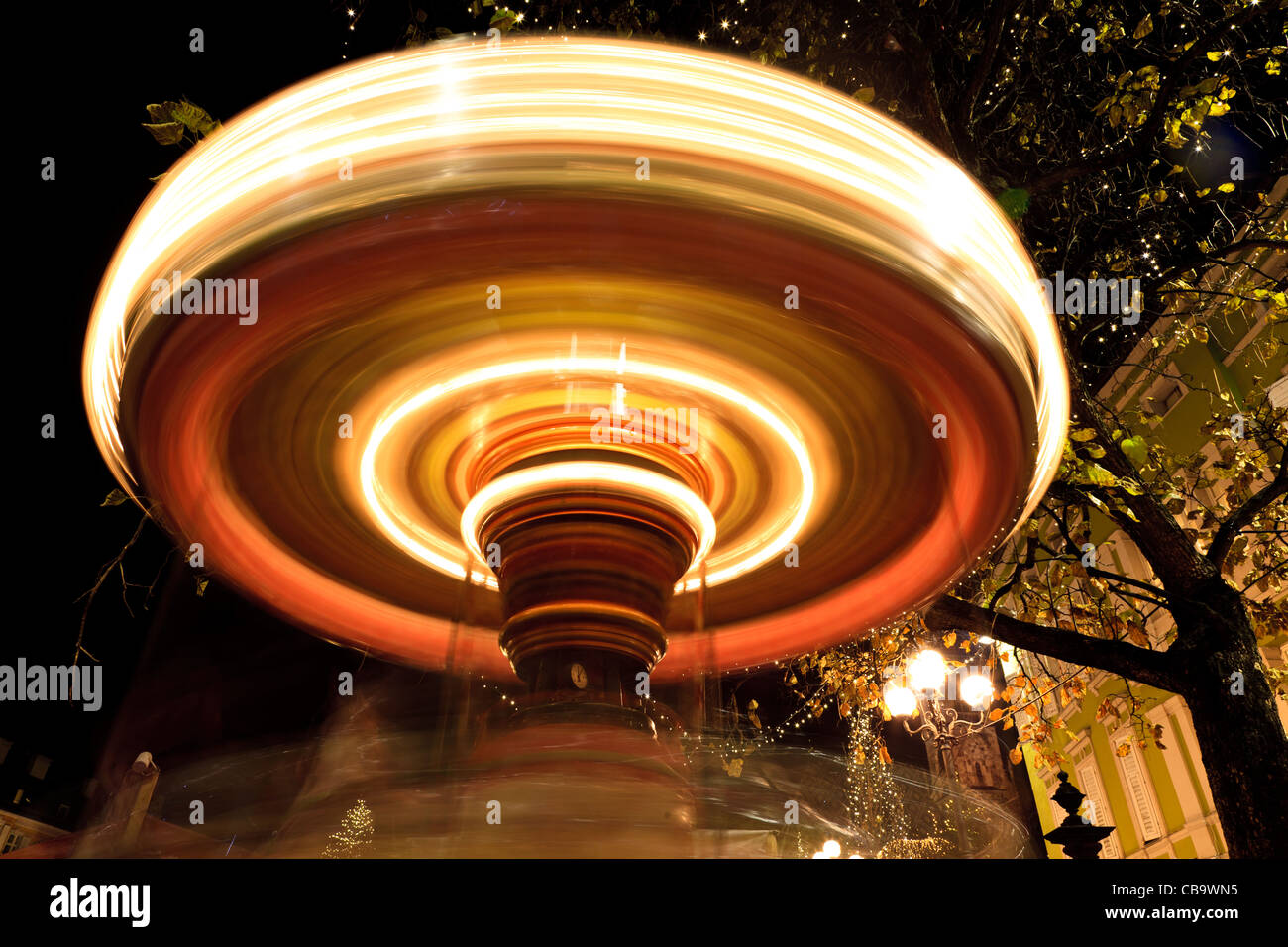 Karussell in der Nacht, Bozen, Alto Adige, Italien Stockfoto