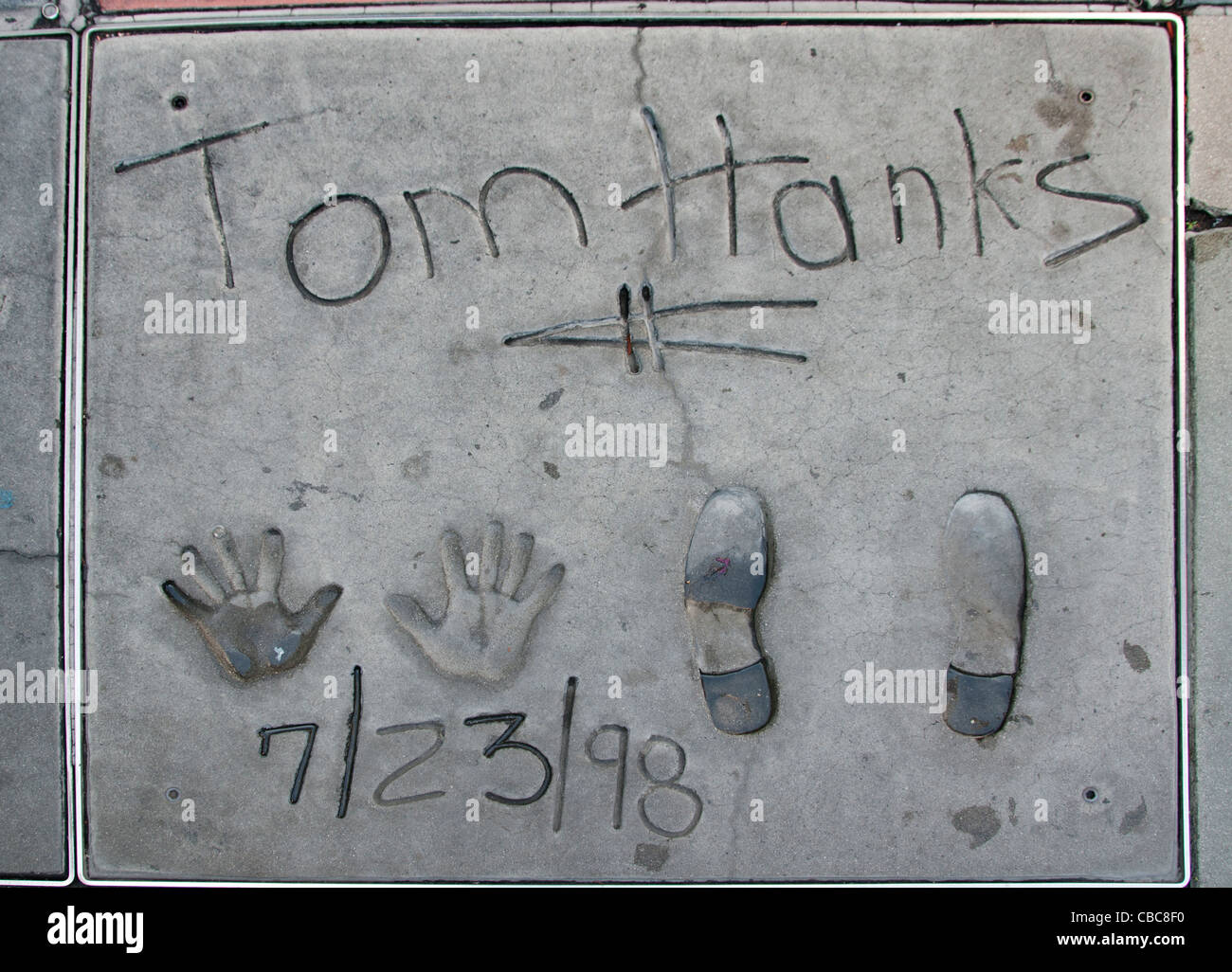 Tom Hanks Hand Fuß Drucke Pflasterung Chinese Theater in Hollywood Boulevard in Los Angeles Stockfoto
