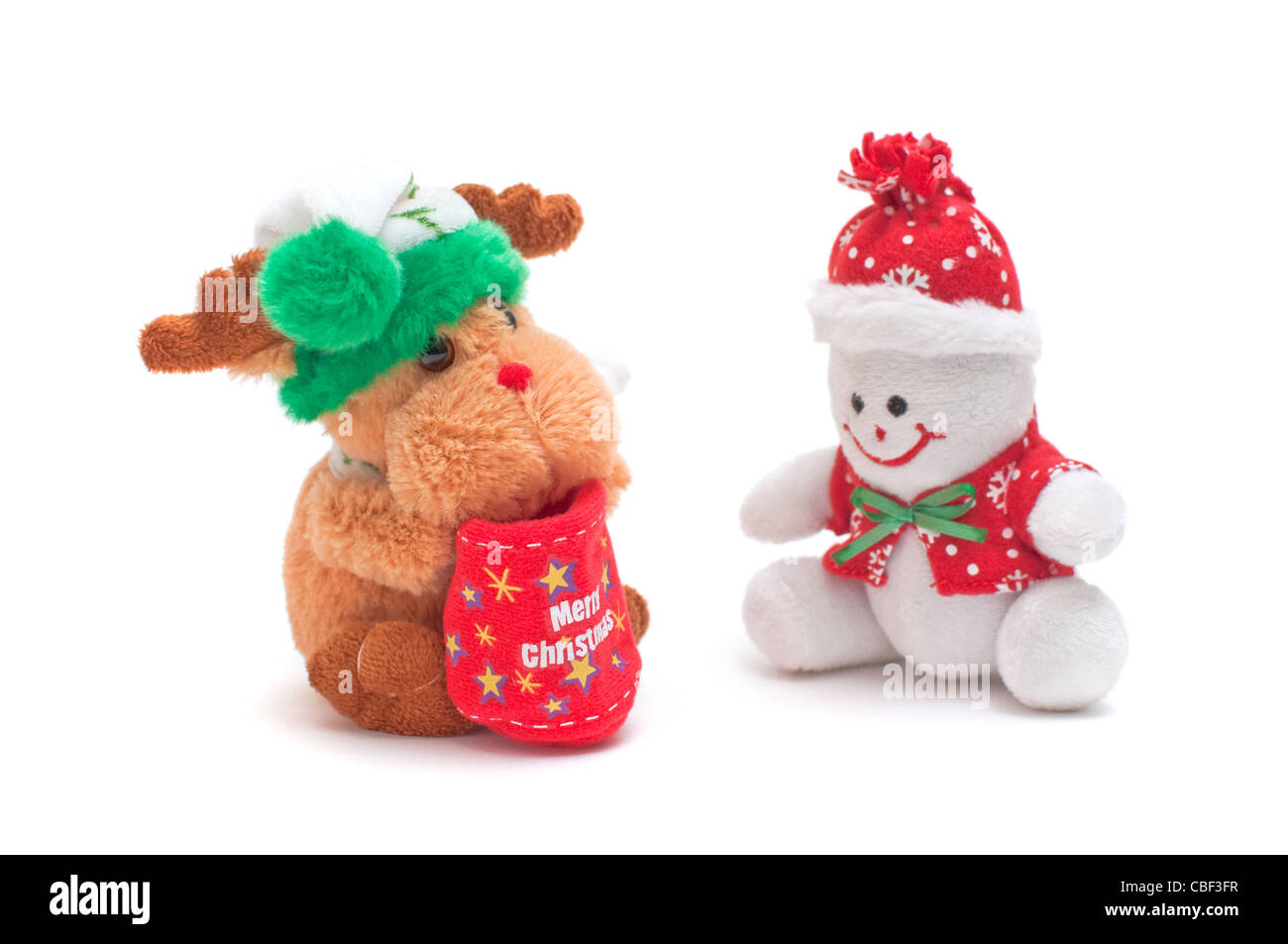 Lächelnd Schneemann Spielzeug gekleidet in Schal und Mütze Stockfoto