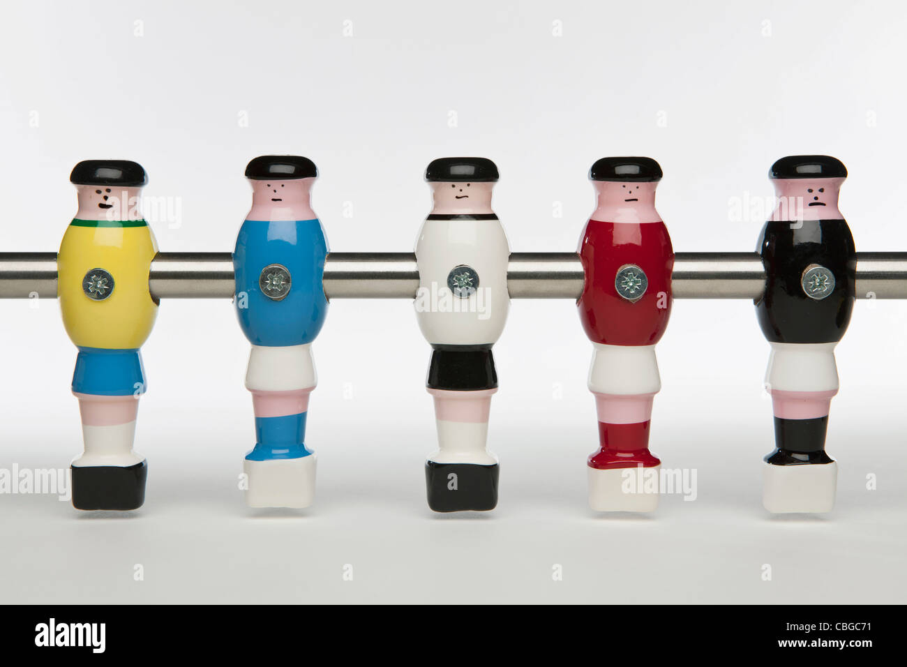 Fünf verschiedene Uniformen Tischfußball-Figuren Stockfoto