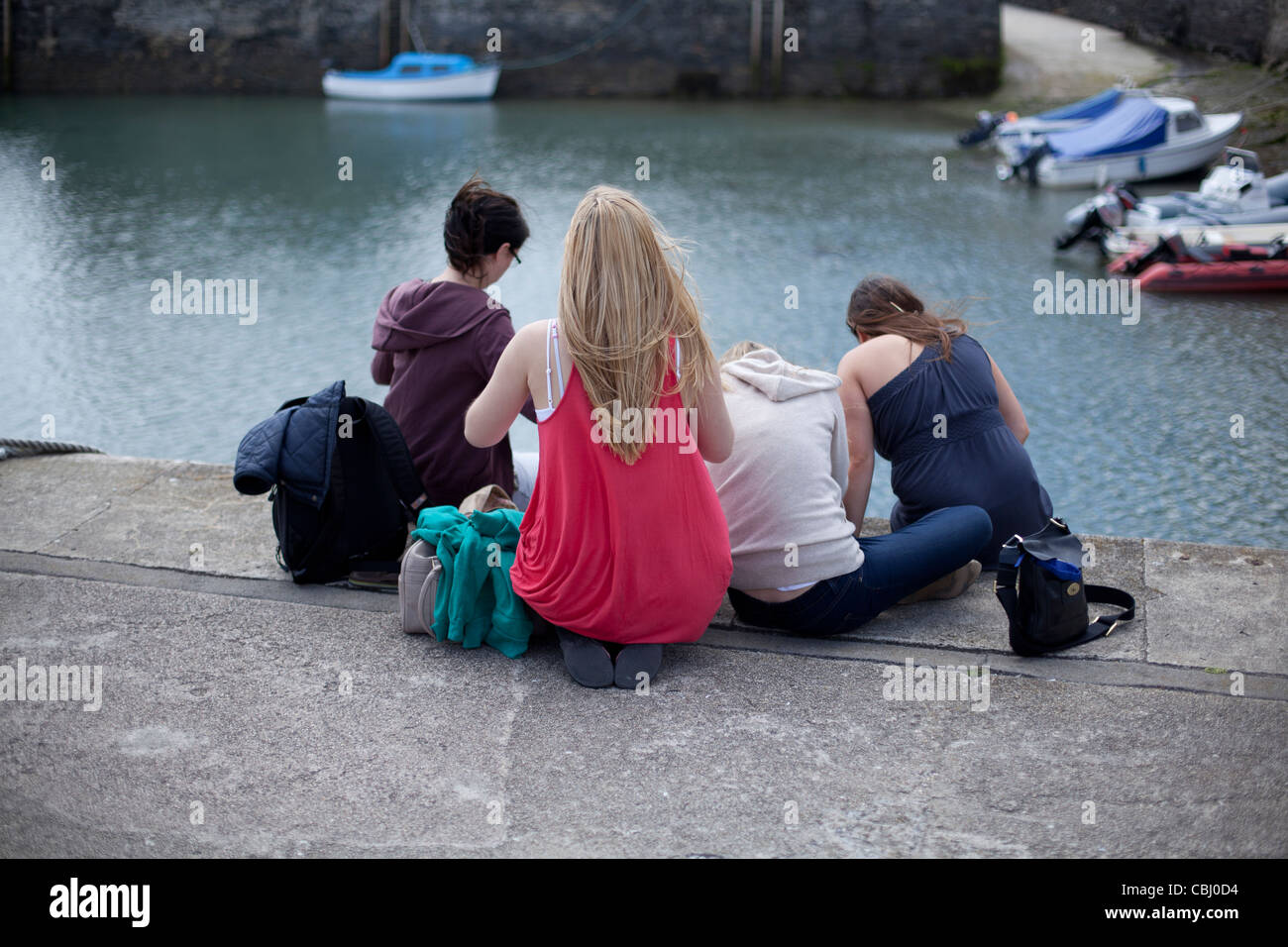 Vier Mädchen-Fische für Krebse off Padstow Hafen, Cornwall Stockfoto