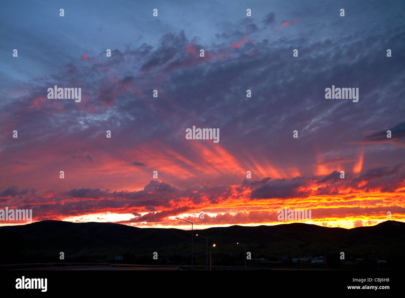 Sonnenuntergang an der Interstate 15 in der Nähe von Dillon, Montana, USA. Stockfoto