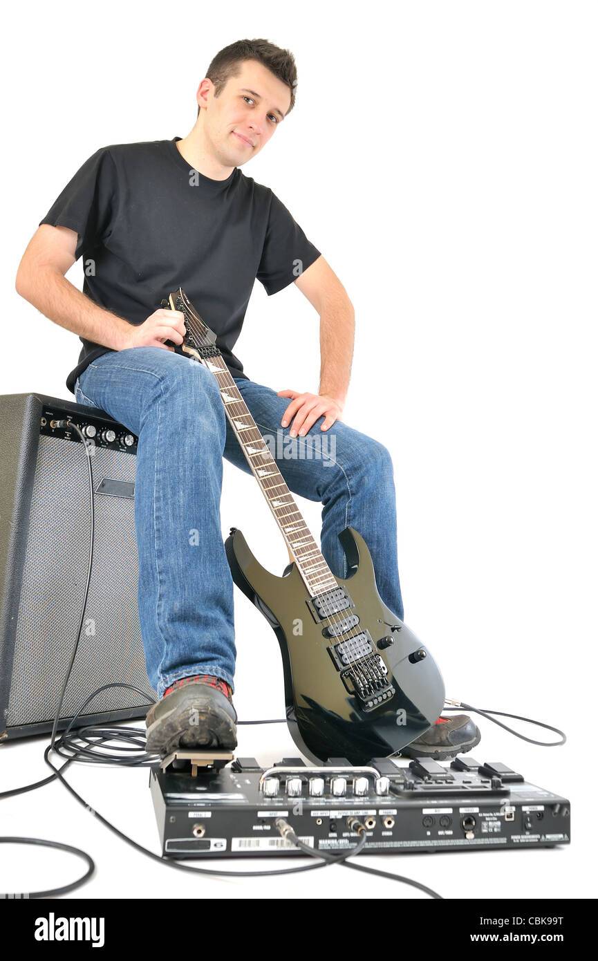 Junge mit Gitarre und einen Verstärker Stockfoto