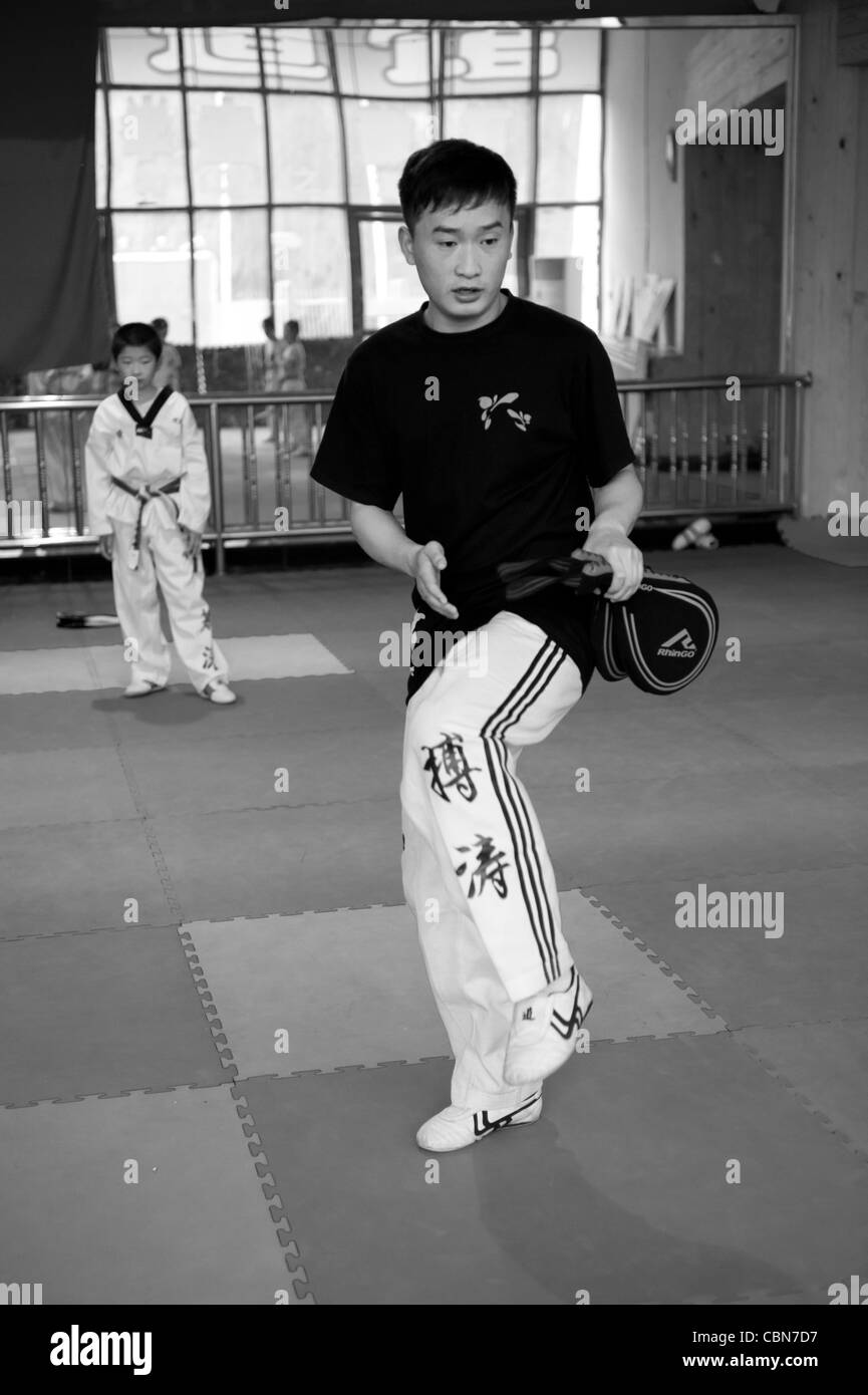 Taekwondo Training Klasse an der BoTao Taekwondo-Schule in Beijing Chaoyang Gymnasium Stockfoto