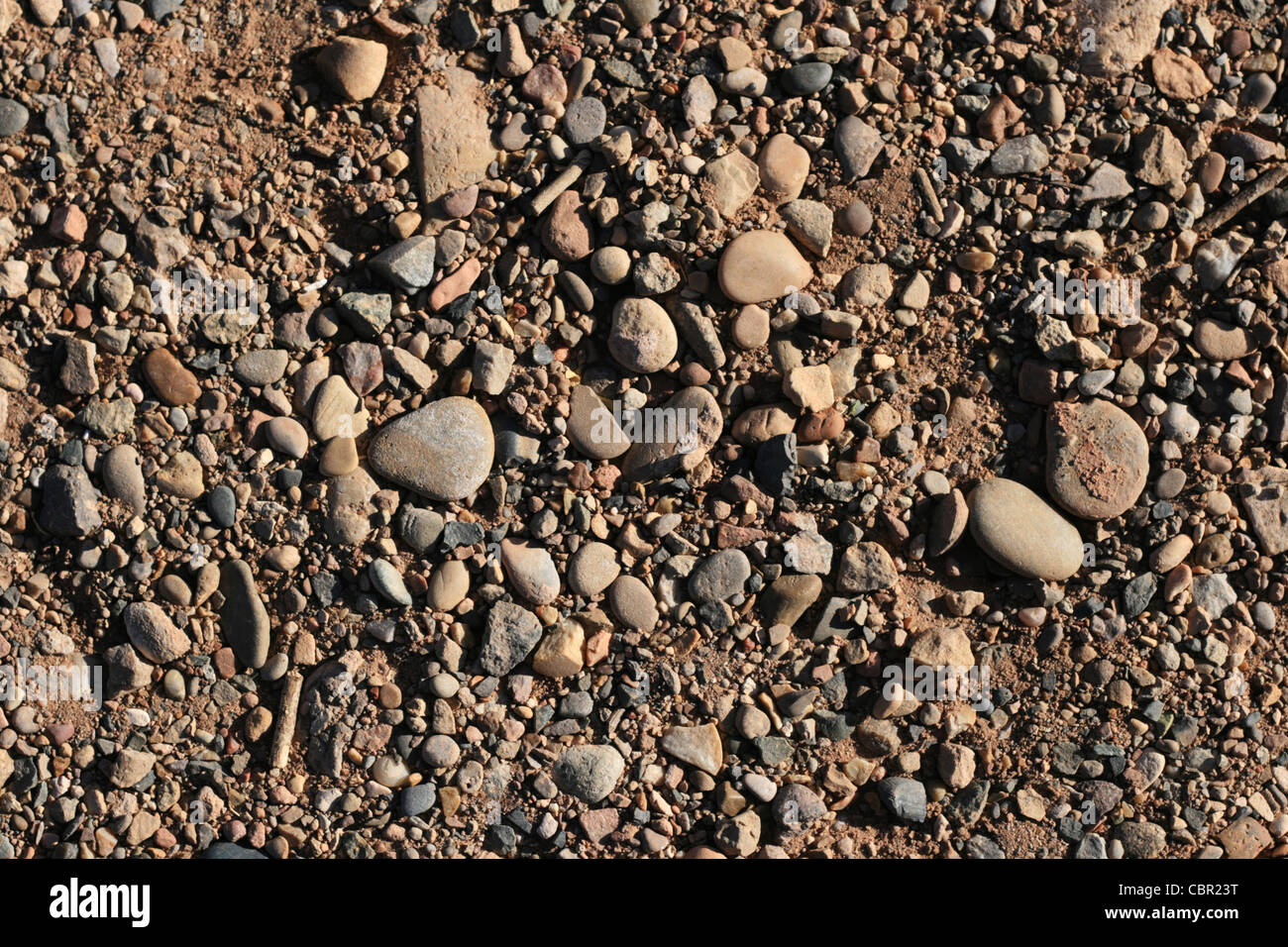 gemischten Kies und Erde Hintergrund gerundet Stockfoto