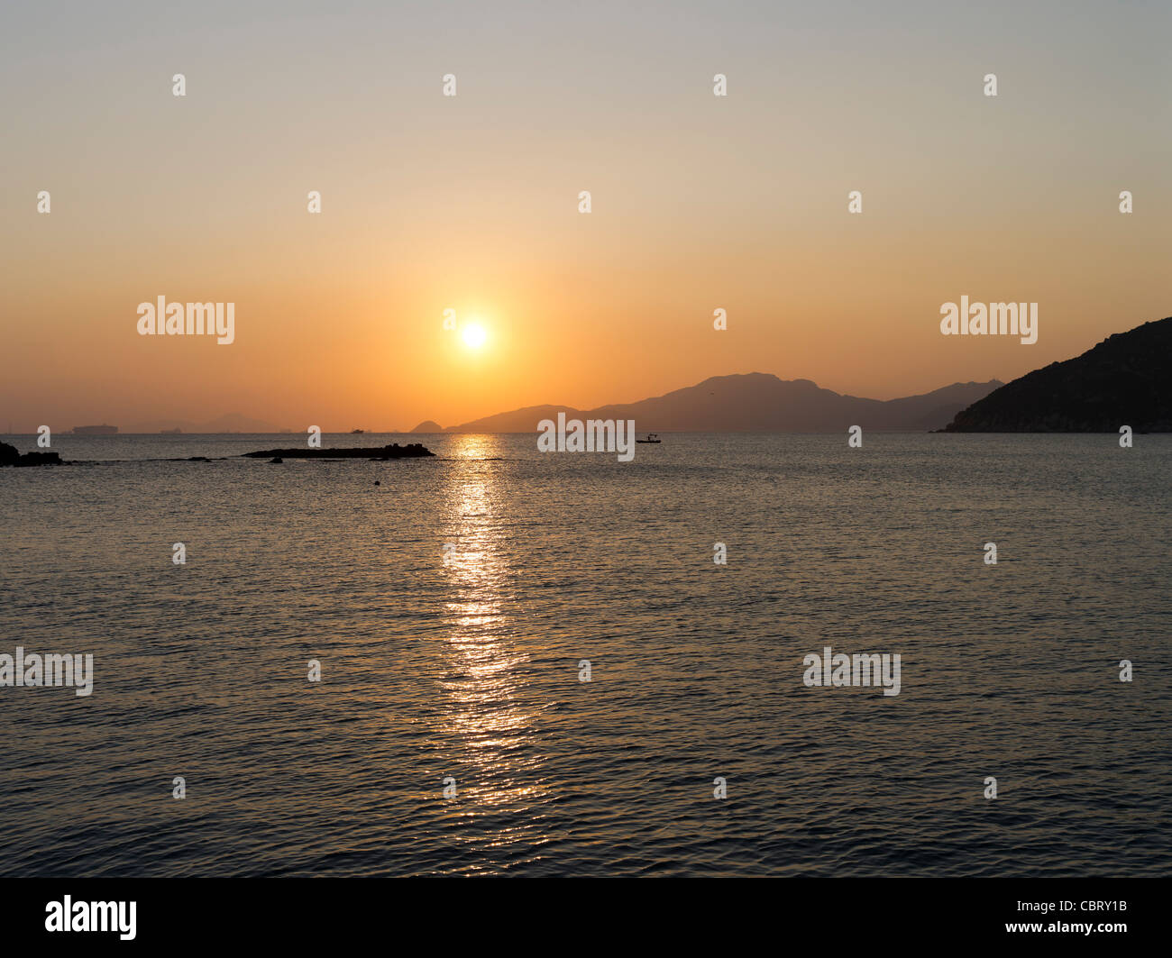 dh STANLEY BAY HONG KONG Fischer und Sonnenuntergang über dem Südchinesischen Meer Stockfoto
