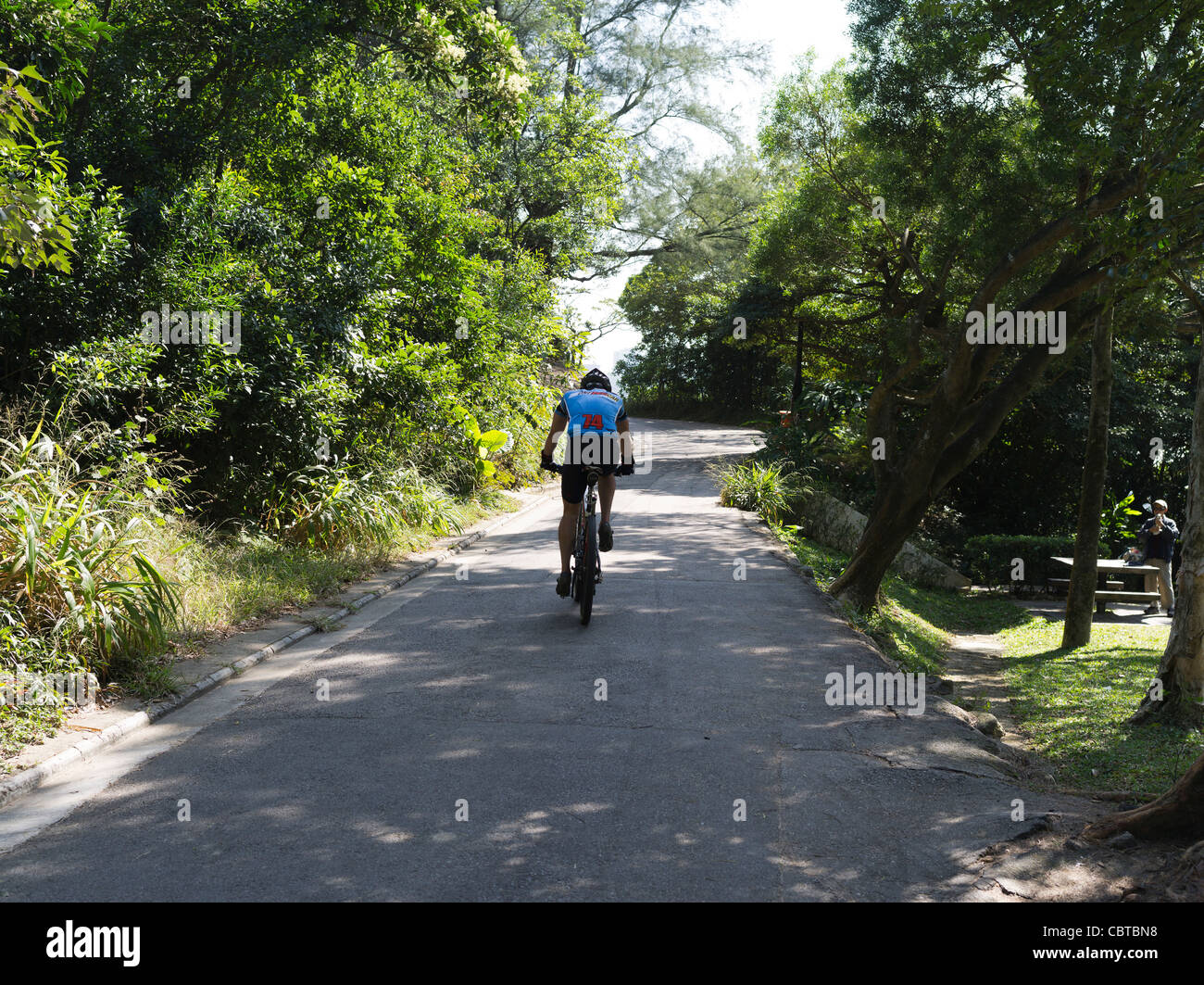 dh Pok Fu Lam Country Park VICTORIA PEAK HONG KONG Mountain Bike Radsportler bergauf Rad Rennradfahrer Stockfoto