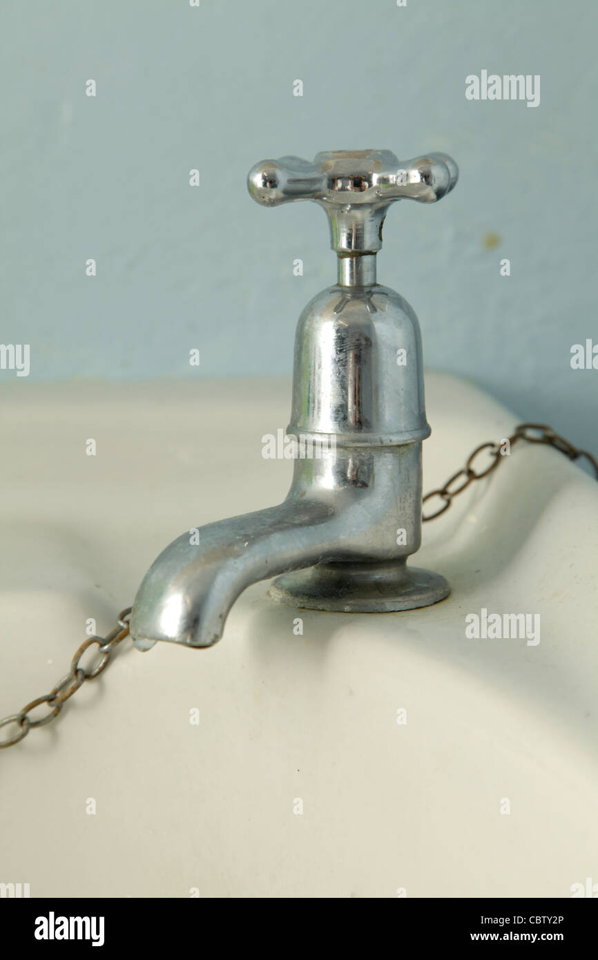 Alte Silber Wasserhahn Stockfoto