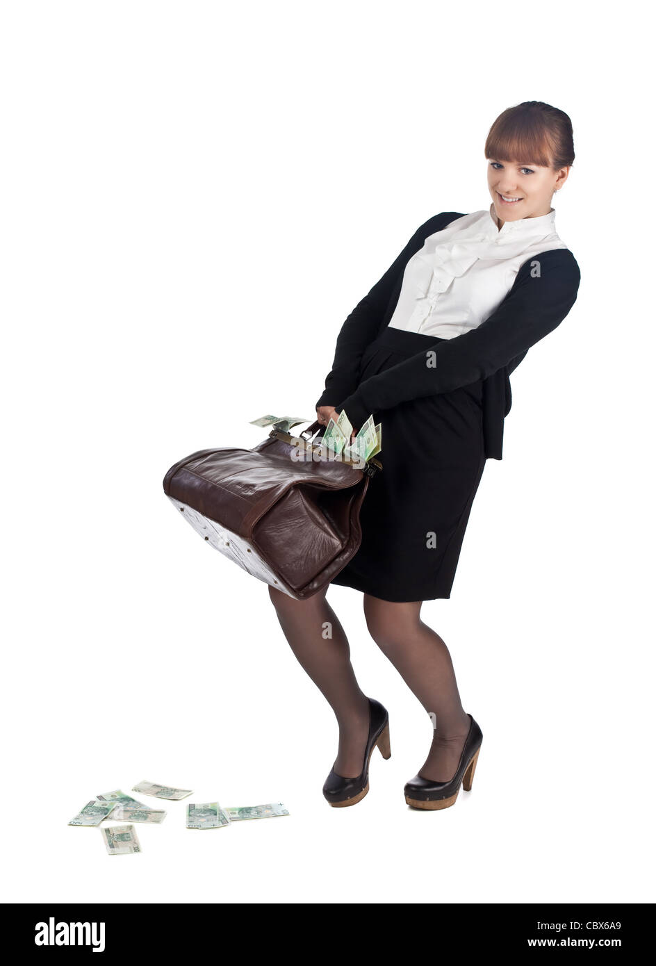 Junge Geschäftsfrau mit voller Geld-Beutel Stockfoto