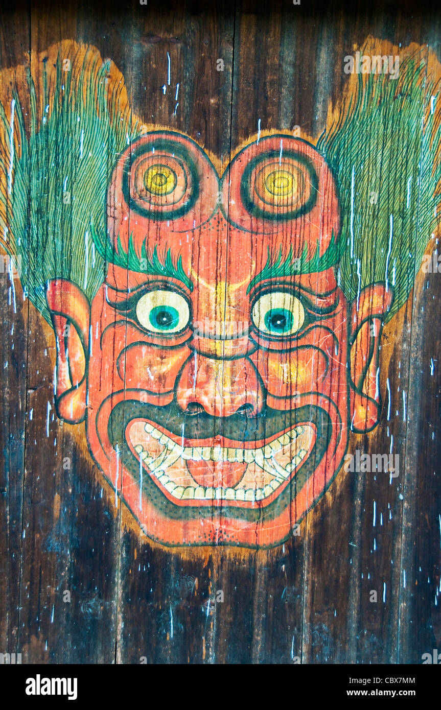Chinesische naiv beängstigend Malerei auf eine Mauer - Dorf in Hunan - China Stockfoto