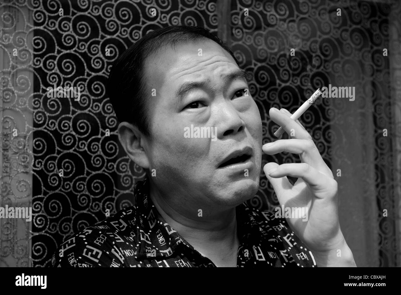 Herr Zhang ist arbeitslos, nach eine Umstrukturierung bei einem Zustand Fabrik im Besitz Stockfoto