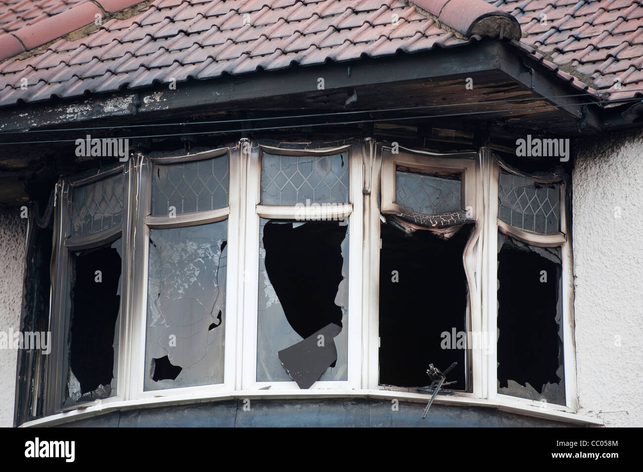 Haus von Kunststofffenstern Feuers zerstört geschmolzen Stockfoto