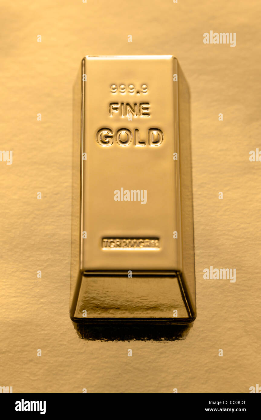 Gold Bar auf einen goldenen Hintergrund Stockfoto