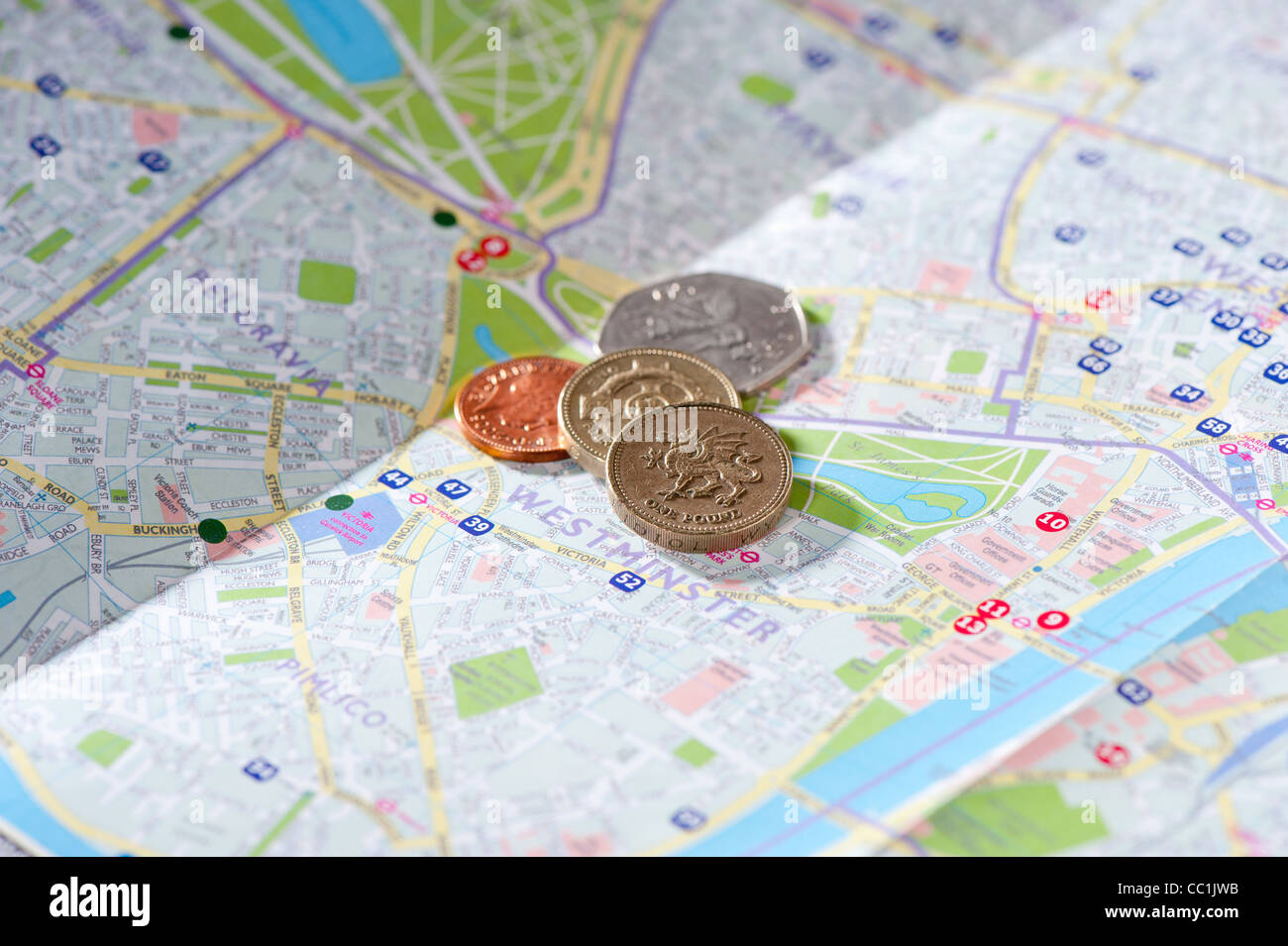 Kleingeld auf London Stadtplan Stockfoto