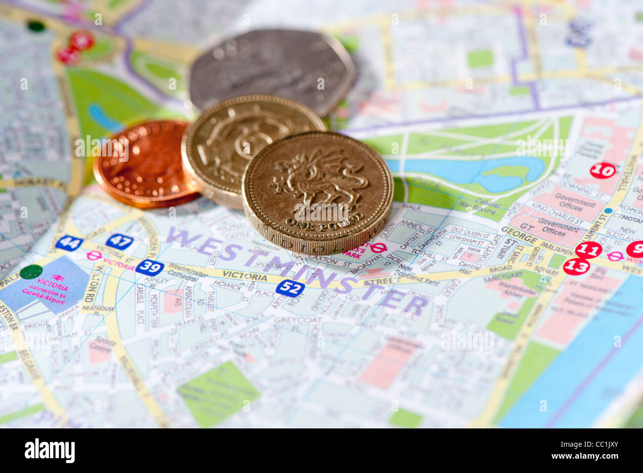 Kleingeld auf London Stadtplan Stockfoto