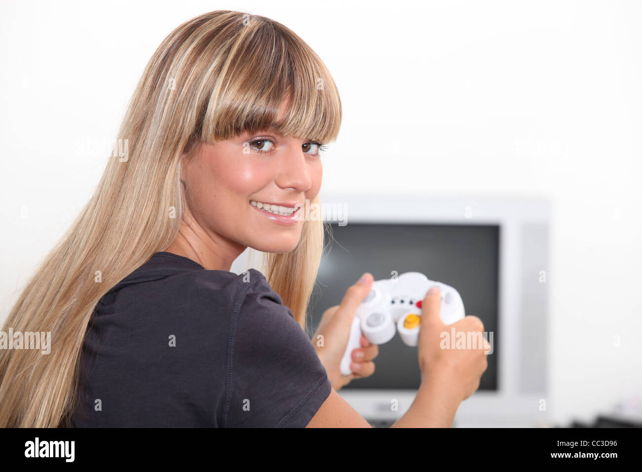Junge Frau Video Spiel Stockfoto