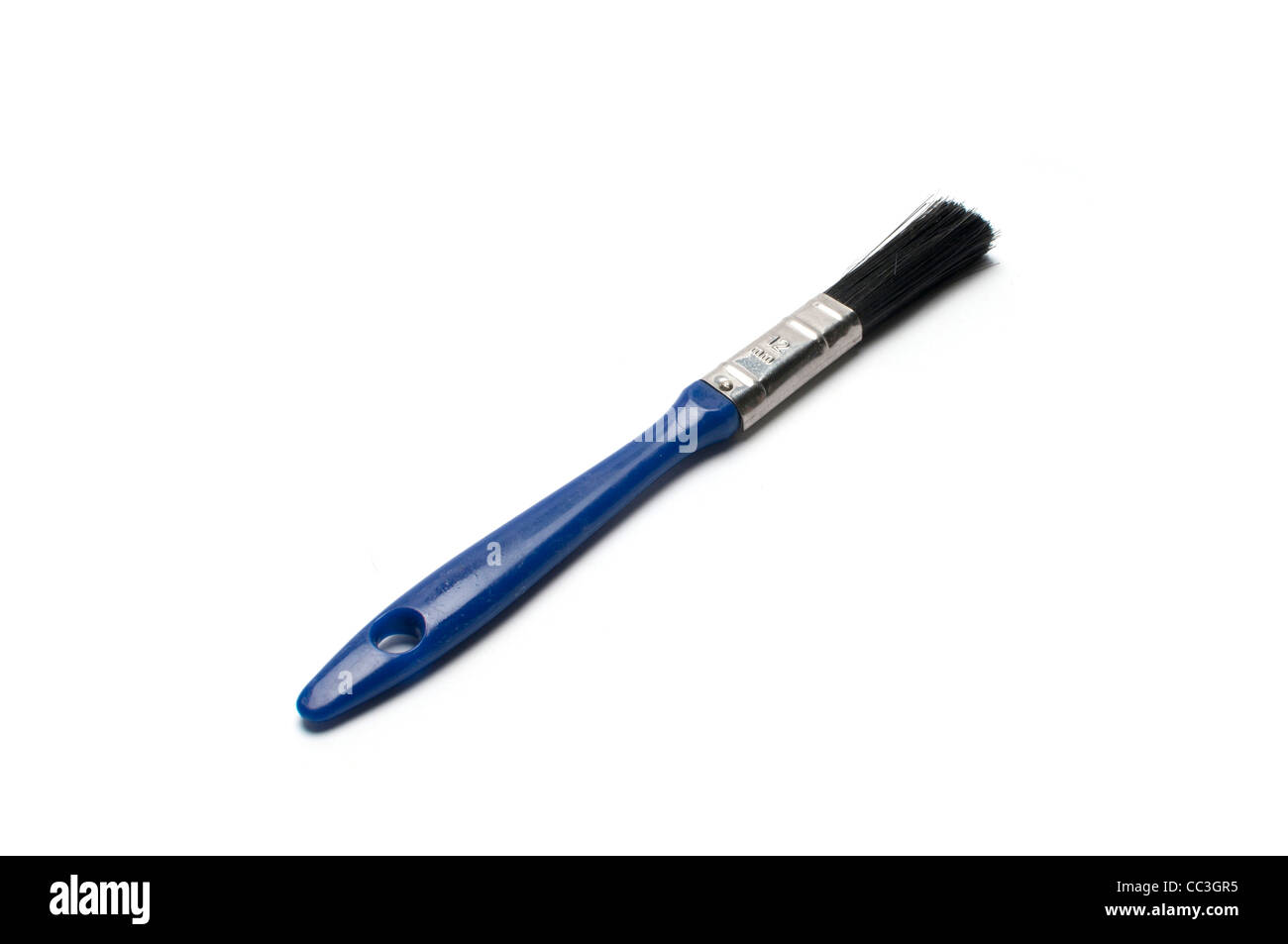 Ein kleiner blauer Pinsel Stockfoto
