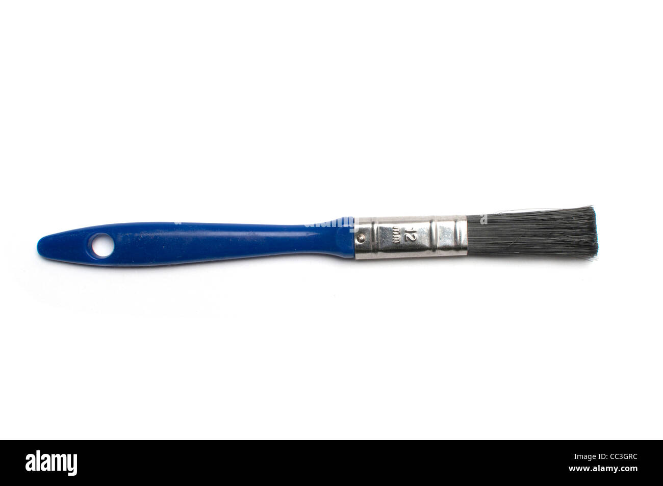 Ein kleiner blauer Pinsel Stockfoto