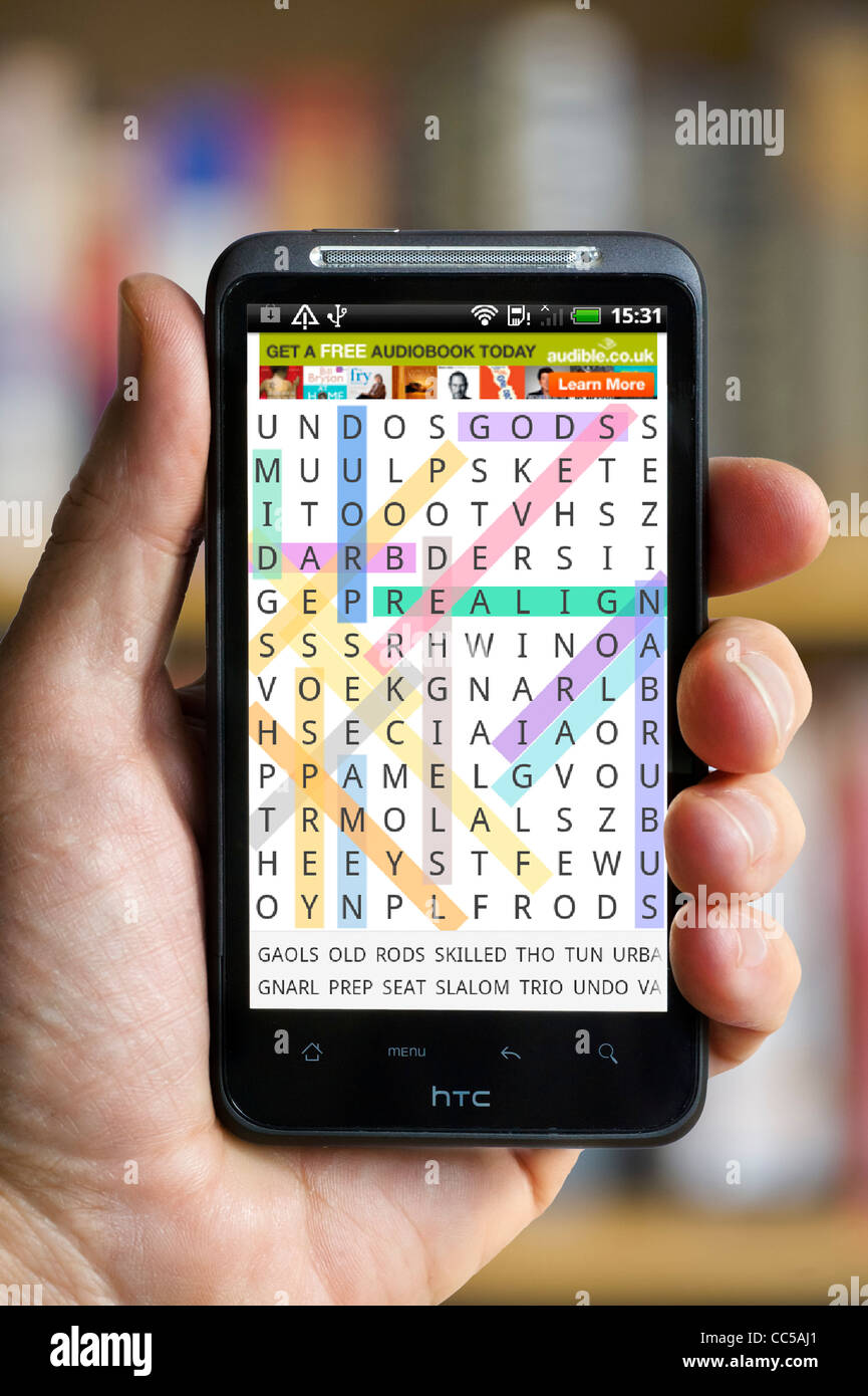 Word Search auf einem HTC-Smartphone zu spielen Stockfoto