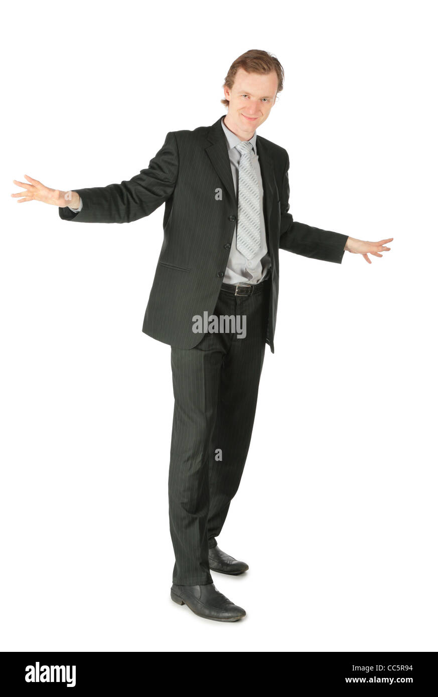 Stehender Geschäftsmann mit getrennten Händen Stockfoto