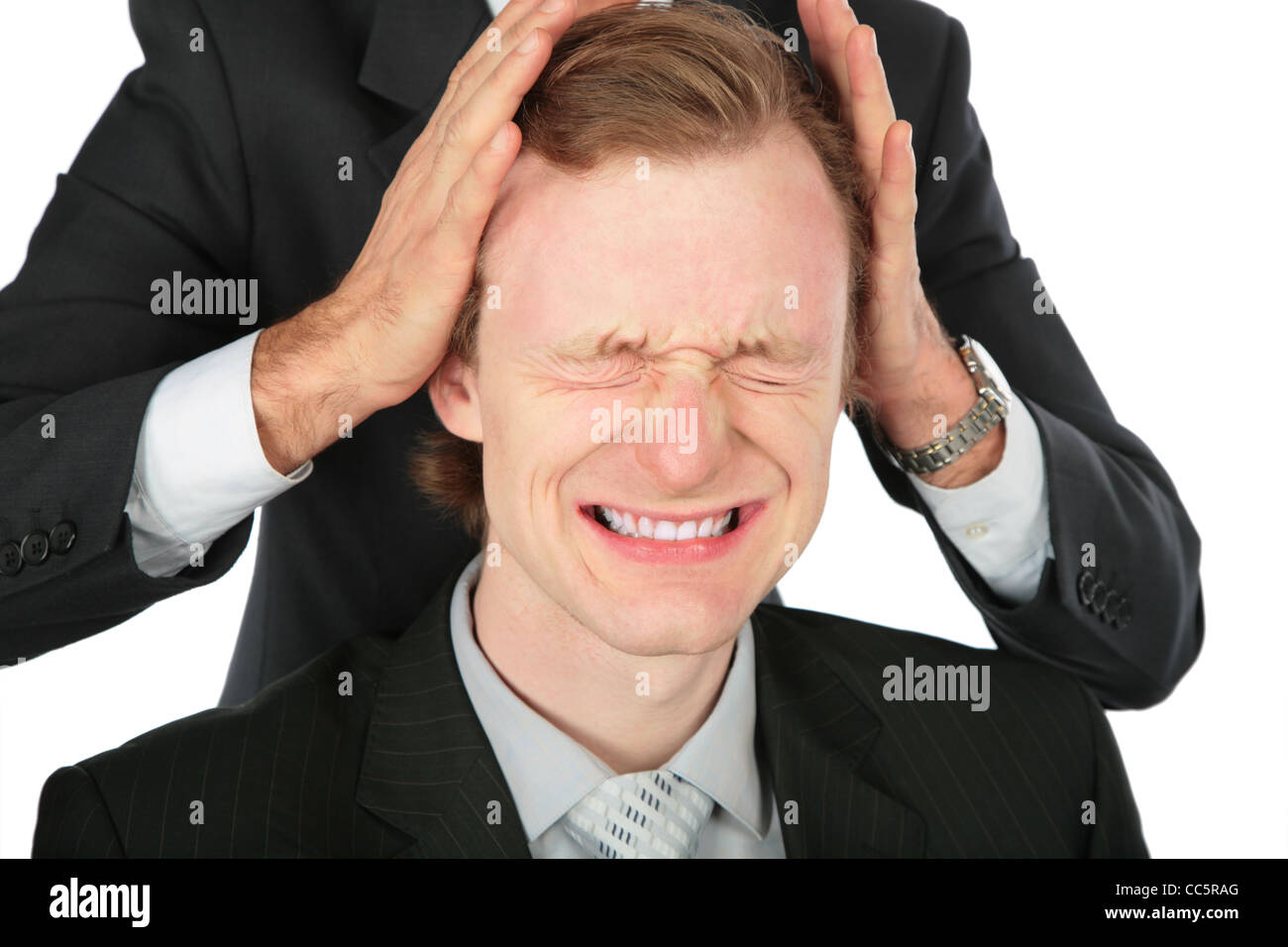Ein Geschäftsmann hält ein anderes für Kopf Stockfoto