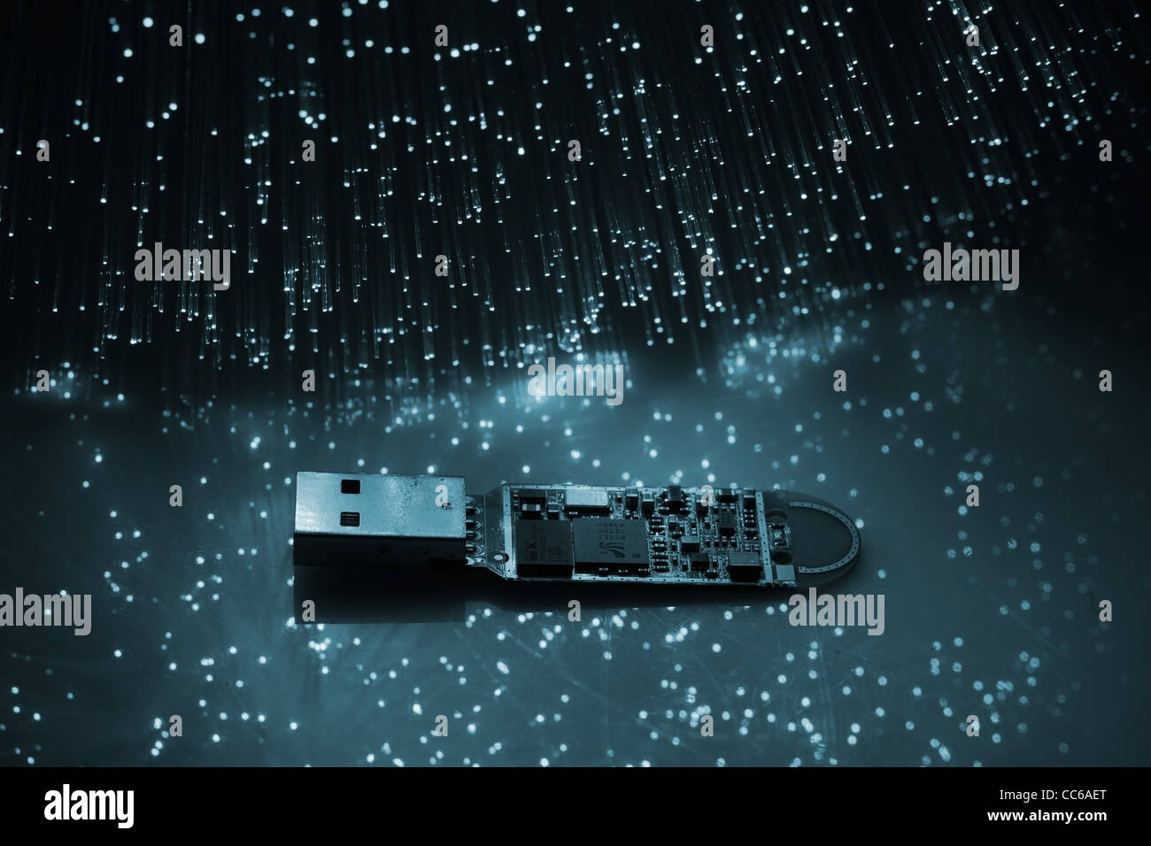 FaseroptikHintergrund mit vielen blauen Lichtpunkte Stockfotografie