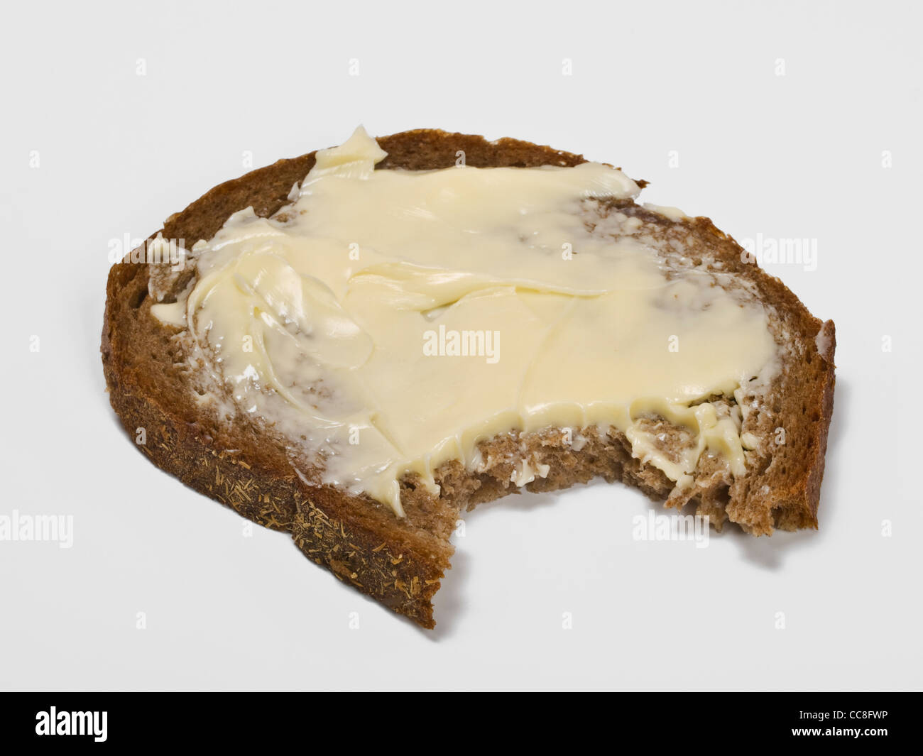 Detailansicht Eines Angebissenen Butterbrotes | Detail-Foto von Brot und Butter angeschlossen werden Stockfoto