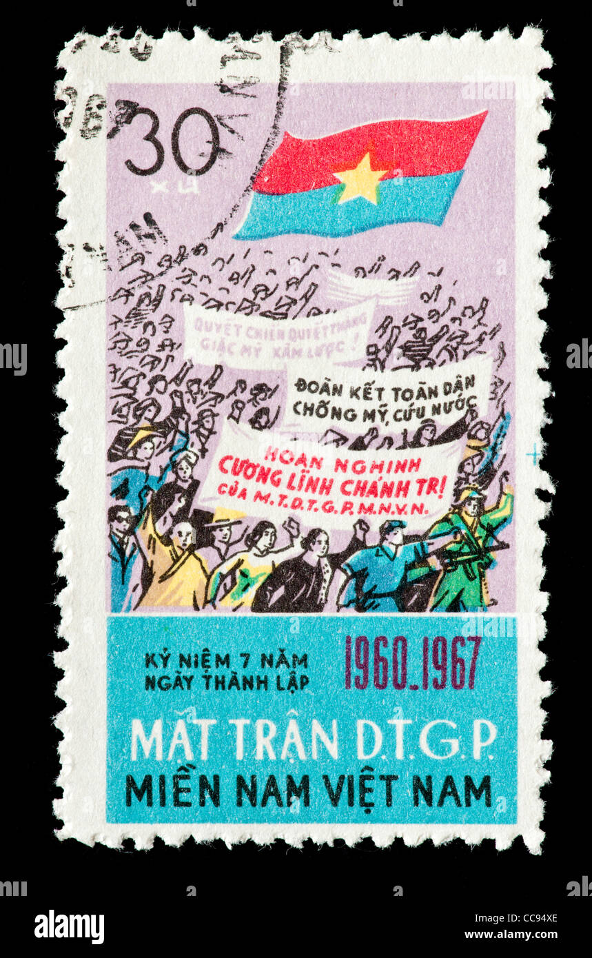 Briefmarke von Nordvietnam mit Fahnen und Arbeitnehmer Stockfoto