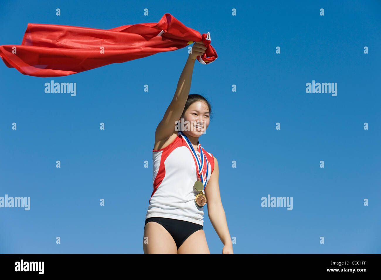 Weibliche Athleten geehrt auf podium Stockfoto
