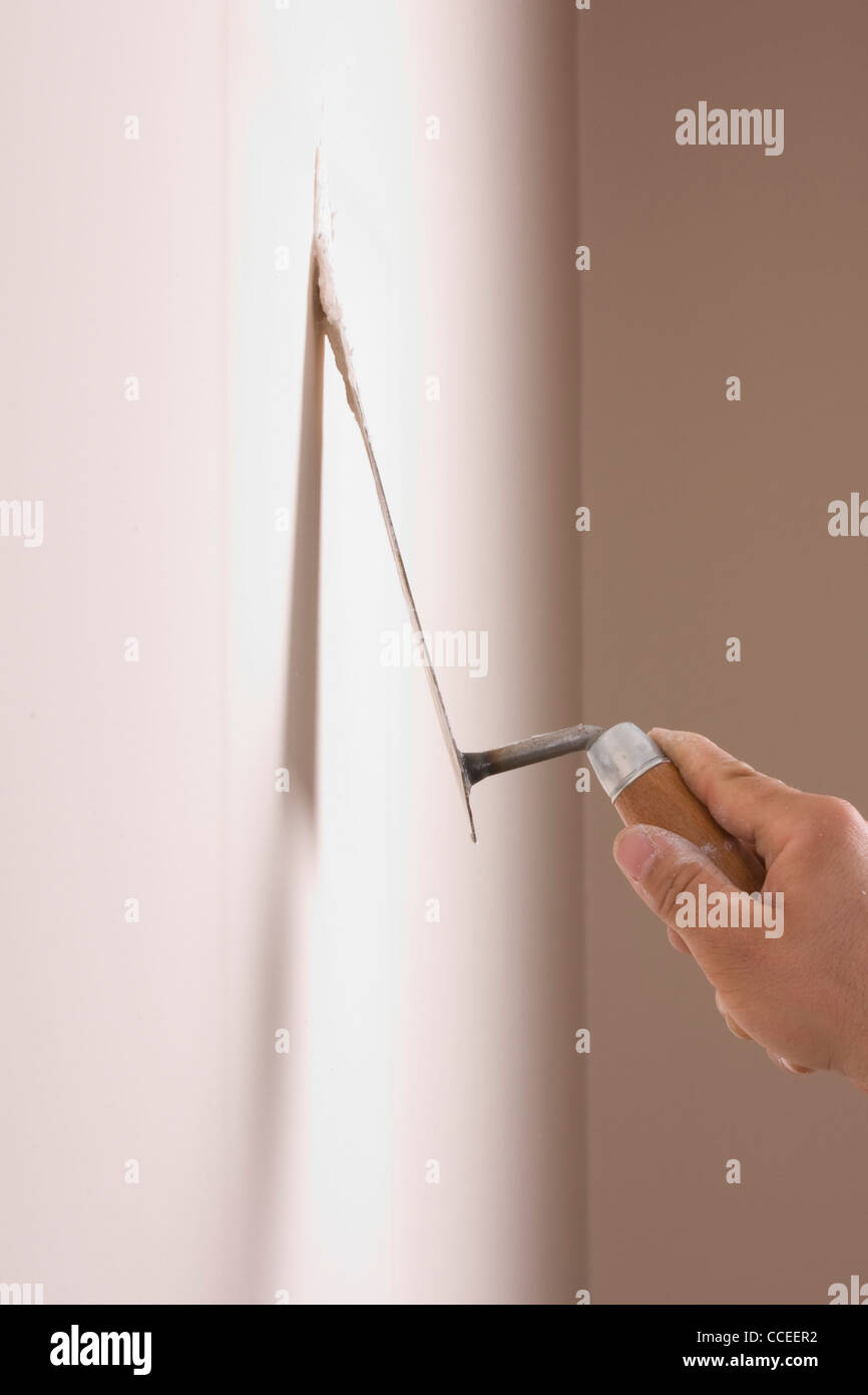 Spachtel mit Paste, Wand Schaden zu reparieren Stockfotografie - Alamy
