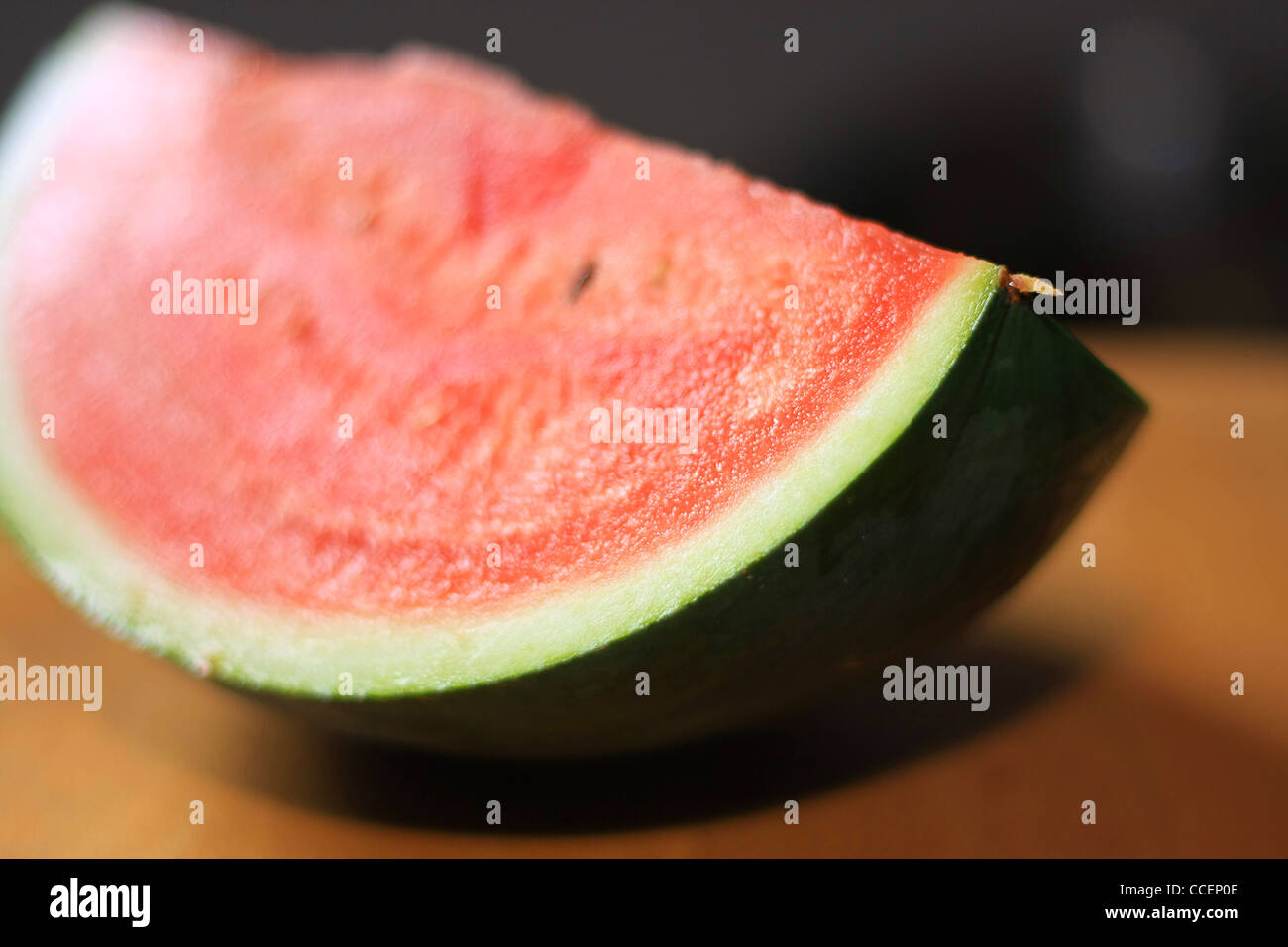 Ein Viertel der eine Reife Wassermelone in Nahaufnahme Stockfoto