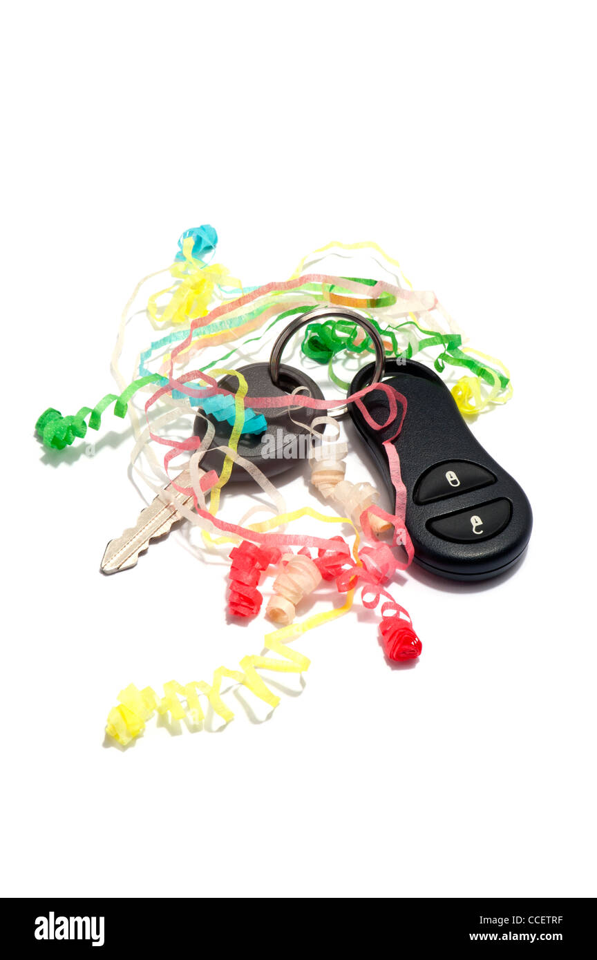 Ein Autoschlüssel und Partystromer Stockfoto