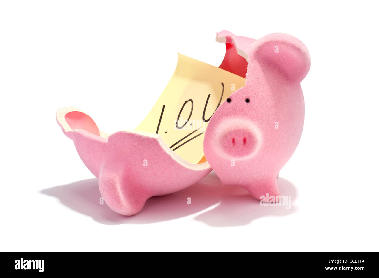 Eine I.O.U Note in einem gebrochenen Sparschwein Stockfoto