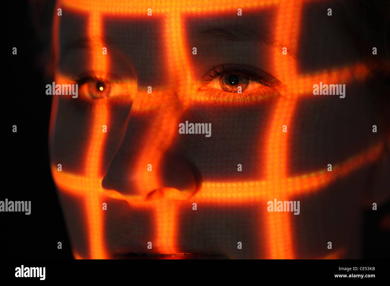 Biometrie, Symbolfoto. Automatische Gesichtserkennung mit einem Laserscanner. 3D-Modell eines weiblichen Gesichts zur Erzeugung von digitalen Daten. Stockfoto