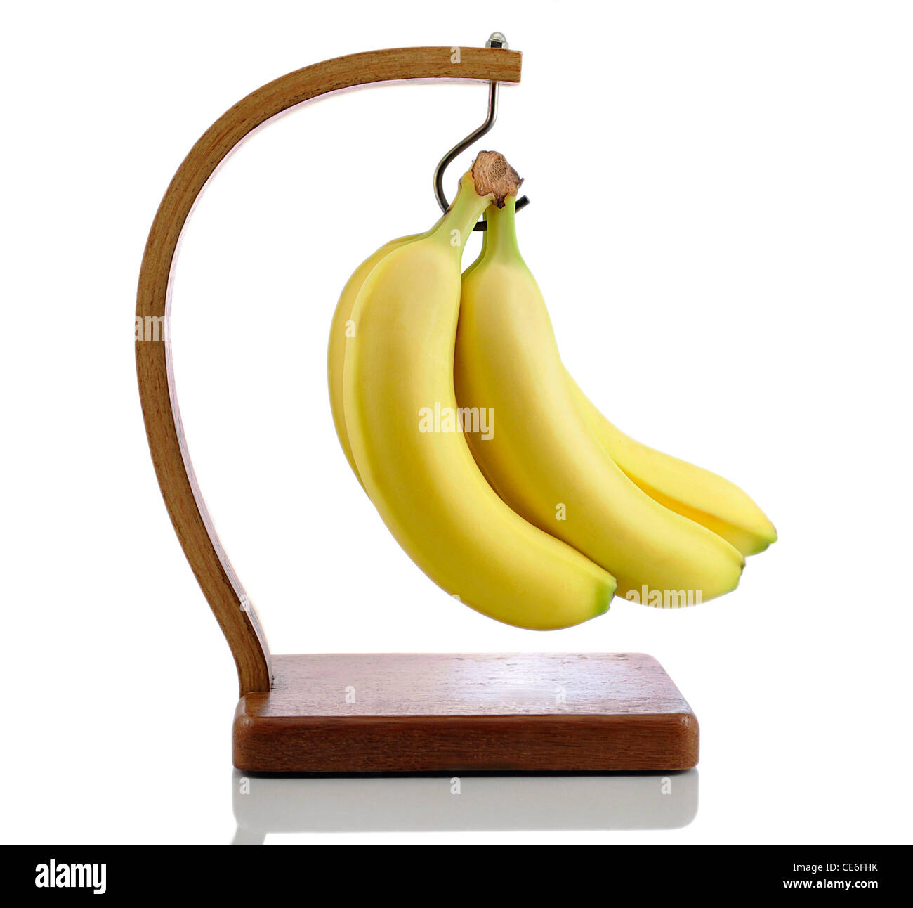 Reife Bananen auf einem Kleiderbügel Stockfoto