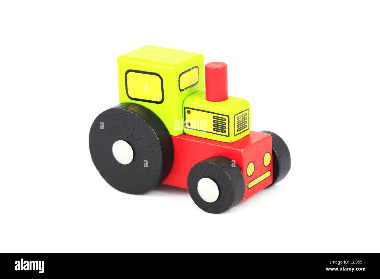 Eine bunte bunte Kinder Kinder Kinder Holz Holz Holz dinky Spielzeug-Traktor weißen Hintergrund ausschneiden. Stockfoto