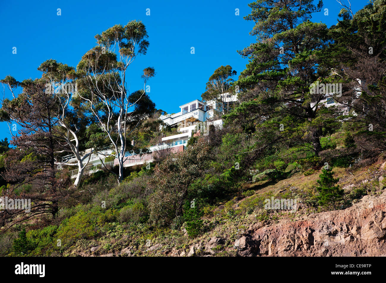 Häuser am Rande der Klippen am Sumner, Christchurch, Canterbury, Südinsel, Neuseeland. NZ Stockfoto