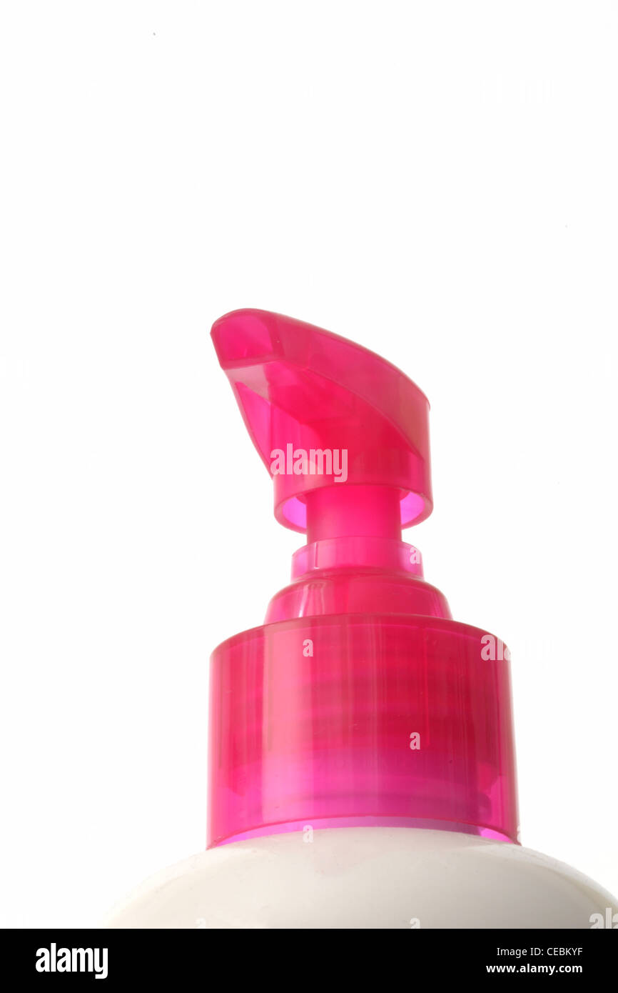 ausfallende Schuss rosa Düse auf Lotion Flasche Stockfoto